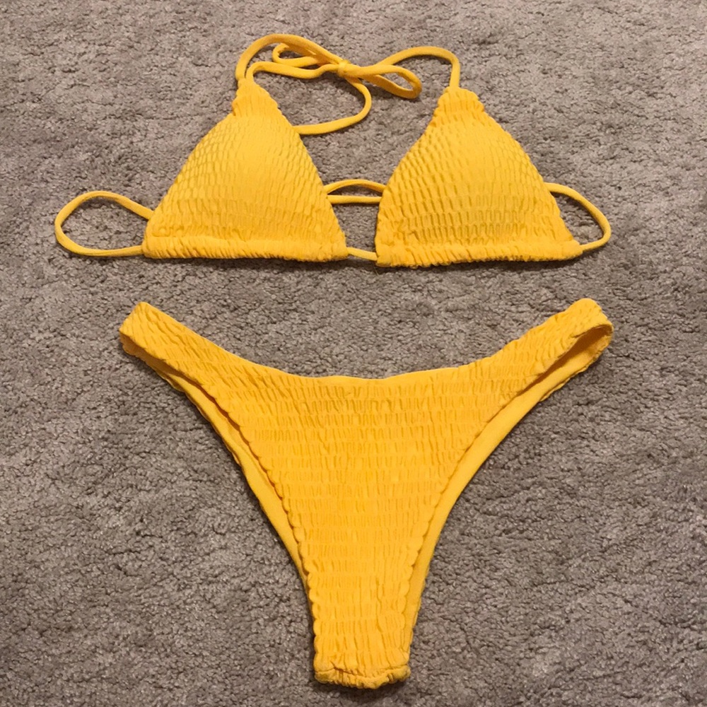 NWOT yellow smocked bikini. Size M